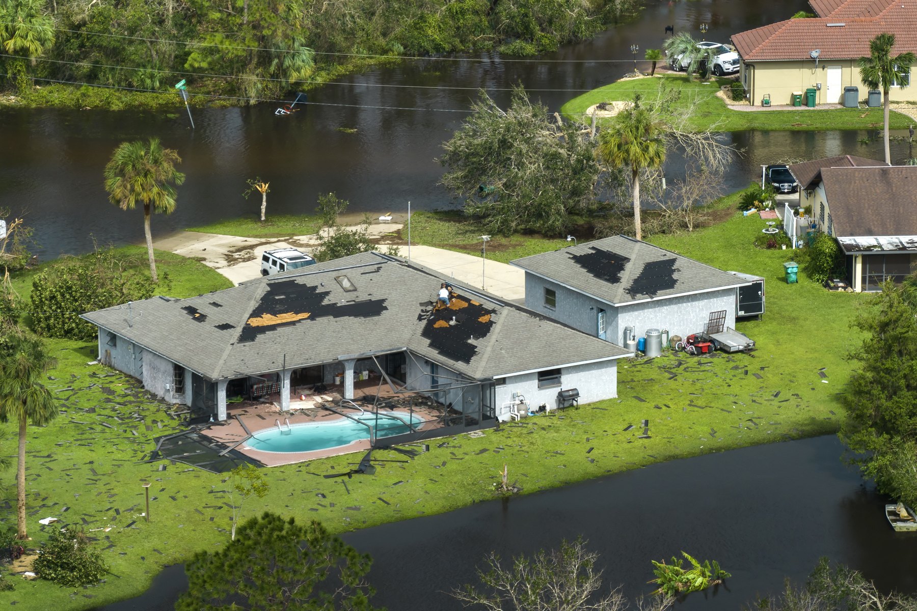 Floodwater surrounding homes after severe hurricane rainfall