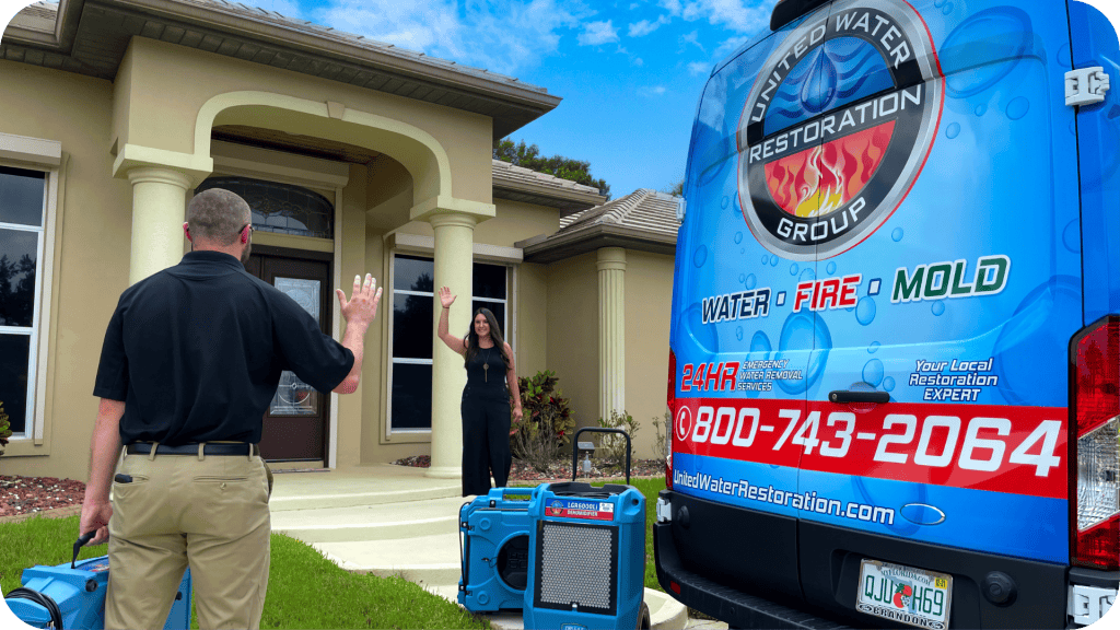 United-water-restoration-technician-greets-customer